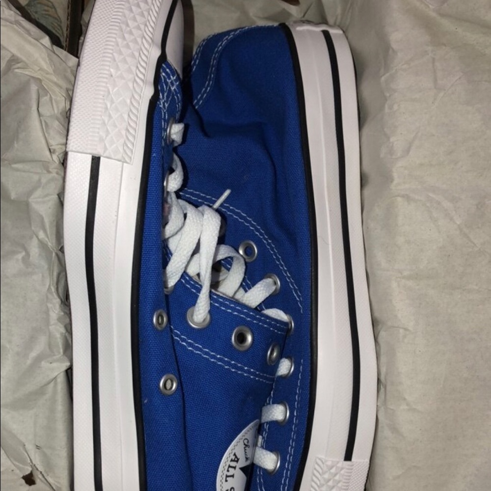 Royal Blue Converse. Never worn. Size 10.5 Women
